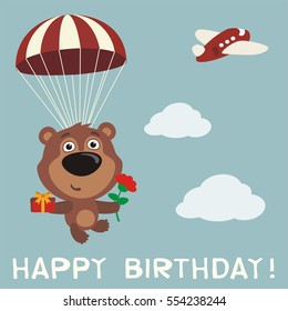 Happy birthday! Funny teddy bear fly on parachute with gift and flower in cartoon style.
