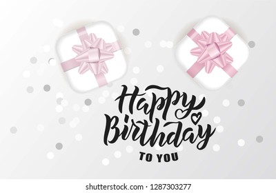 Happy Birthday hand lettering typography with realistic looking gift boxes and confetti. Vector design for greeting cards, banner, poster template. Celebration illustration.