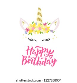 Happy birthday hand lettering. Unicorn logo with horn, ears and flowers. Great for badge, card, greeting, baby birthday party, t-shirt, banner, invitation template. Vector.