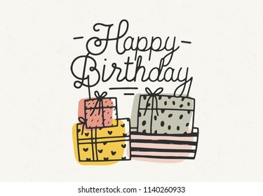 Happy Birthday lettering or wish written with cursive font and decorated with colorful gift or present boxes. Hand drawn decorative vector illustration for festive greeting card, party invitation.