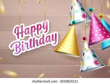 Happy birthday party hats vector design. Happy birthday greeting text in paper cut decor with colorful hanging party hat and confetti elements for kids birth day card design. Vector illustration