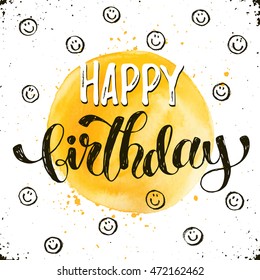 Happy birthday text hand drawn with dry brush. Bright and modern ink lettering for greeting cards design. Birthday phrase with smileys on white background.