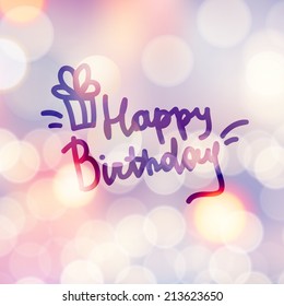 happy birthday, vector handwritten text on beautiful blurred background