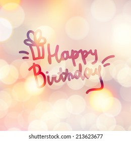 happy birthday, vector handwritten text on beautiful blurred background