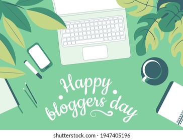 Happy blogger day. Work desk with laptop, mobile phone and work accessories among green foliage. Top view. Flat vector