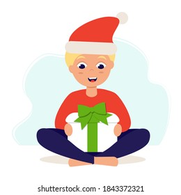 Happy boy with a Christmas present. Christmas and New Year card. Vector illustration in flat style