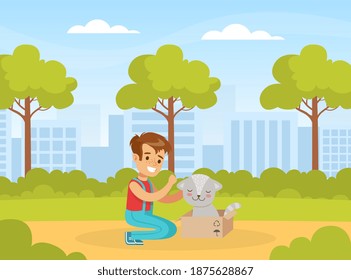 Happy Boy with Cute Cat in Box, Child Walking in Park Cartoon Vector Illustration