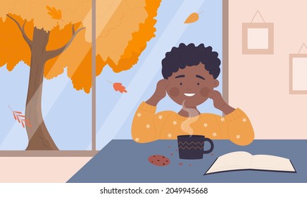 Happy boy drinking hot tea or chocolate, child eating cookies and reading book vector illustration. Cartoon kid character sitting at table by window with autumn tree, studying at home background