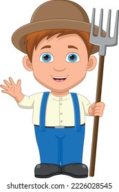 happy boy farmer holding a rake