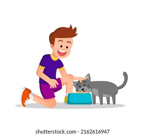 a happy boy feeds his cute cat