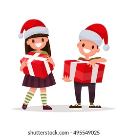 Happy boy and girl with Christmas gifts. Vector illustration of a flat design