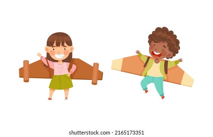 Niño y niña feliz jugando con alas de avión de juguete de cartón ilustración vectorial de dibujos animados