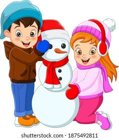 Happy boy and girl playing with a snowman