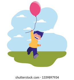 happy boy holding balloon