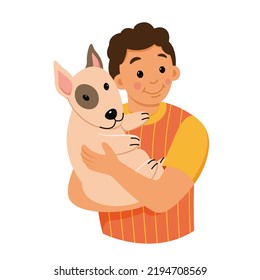 Happy boy holding dog in hands vector illustration. Cartoon isolated young male pet owner hugging bullterrier with love and care, happy hugs and friendship of smiling guy and domestic animal