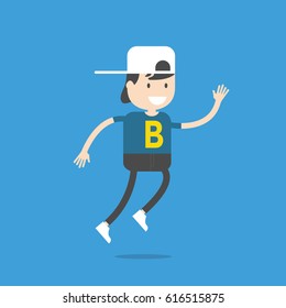 Happy boy jumping on blue background