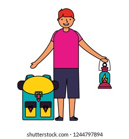 happy boy with lantern and backpack camping