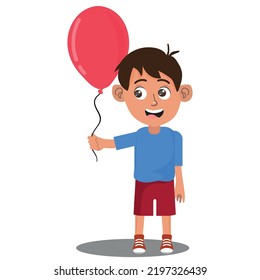 happy boy with a red balloon.
