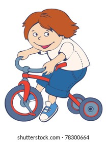 Happy boy riding a bicycle.