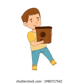 Happy Boy in Rubber Boots Walking with Nesting Box Engaged in Spring Season Activity Vector Illustration