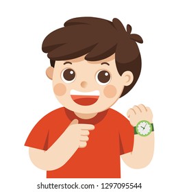 Happy boy showing wrist watch. Shows a time. Little boy pointing at his wrist watch posing.