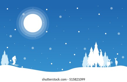 Happy boy skiing in snow Christmas landscape