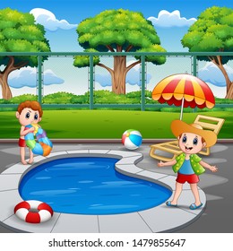 Happy boys enjoying playing in outdoor pool