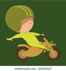 Happy brave kid on balance bike 