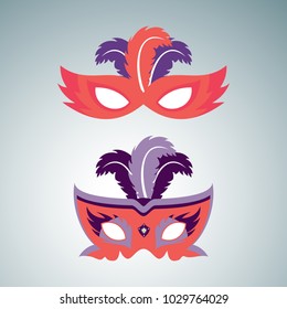 Happy Brazilian Carnival Day. set of 2 orange carnival masks