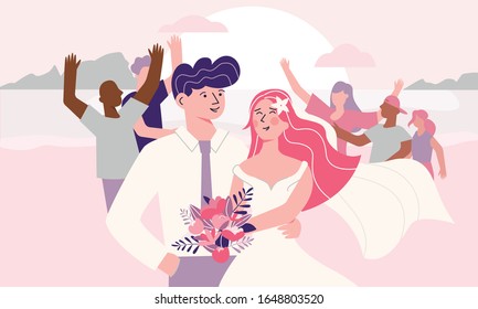 Happy bride and groom and their guests on beach wedding. Young couple in wedding costumes cuddling on sunset seashore and having fun with their family members and friends of different races.