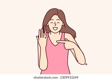 Happy bride with wedding ring shows off gift from groom and rejoices at proposal to get married. Woman with smile demonstrates wedding ring on finger for concept of successful marriage