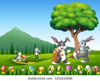 Happy bunnies playing on the nature background