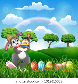Happy bunny holding a decorated easter egg