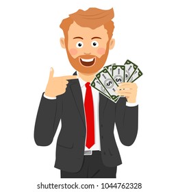 Happy business man pointing to a fan of dollar bills
