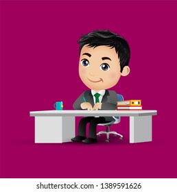 Happy business man sit at the table.
