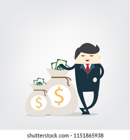 Happy business man stand near Money bag,success concept