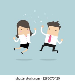 Happy Businessman and Businesswoman Jumping. Business Concept.