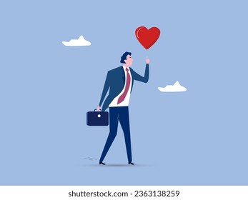 Happy businessman holding passionate heart shape walking to work.Work passion to motivate and inspire employee to achieve career success, love your job or happy and enjoy working dream job concept.