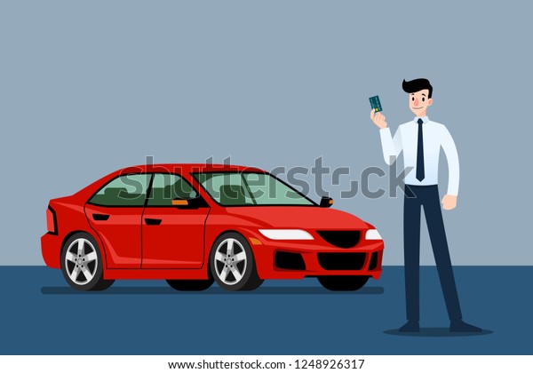 Happy\
businessman, seller stand and holding credit card in front of\
luxury car that parking in large\
showroom.