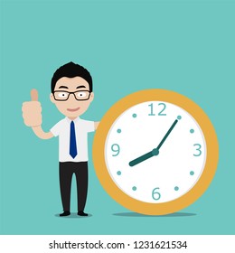 Happy businessman with thumb up gesture is standing near a big clock. Concept of time management