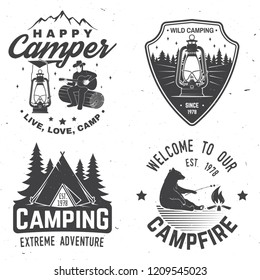 Happy camper. Vector illustration. Concept for shirt or logo, print, stamp or tee. Vintage typography design with lantern, camping tent, campfire, bear, man with guitar and forest silhouette.