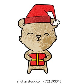oso de caricatura feliz con regalo