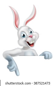 A happy cartoon white bunny rabbit pointing down, could be the Easter Bunny