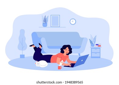 Happy cartoon woman chatting, working, surfing internet at home. Flat vector illustration. Girl doing remote work, lying on floor at cozy living room with laptop and cat. Freelance job concept