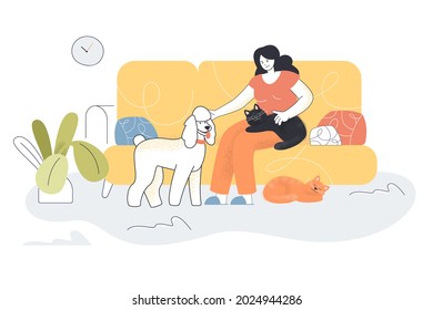 Happy cartoon woman sitting on couch with pets. Flat vector illustration. Girl petting cat and dog, relaxing on yellow cozy sofa. Animal, home, love, friendship concept for banner design, landing page