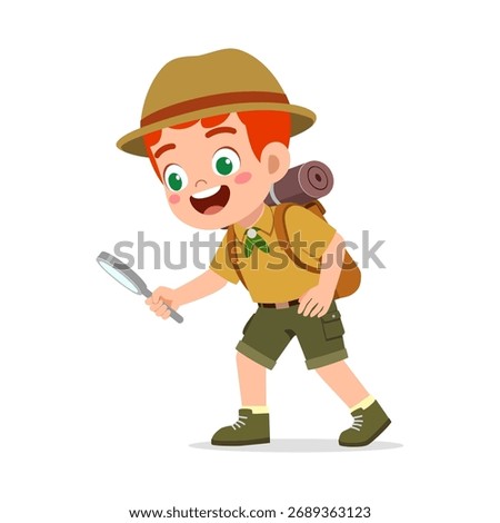 Happy Caucasian Boy Scout Exploring with Magnifying Glass Wearing Hat and Backpack