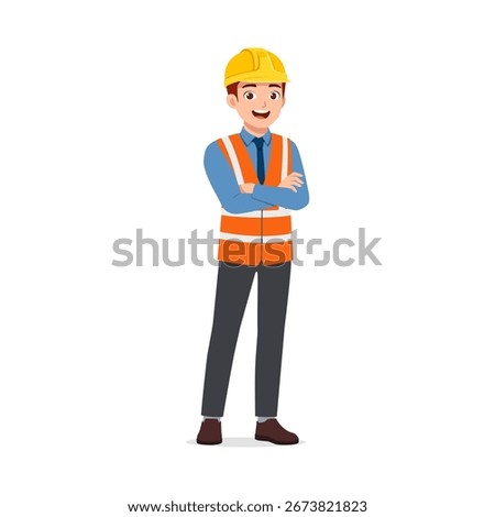 Happy Caucasian engineer standing confidently with arms crossed in safety vest and hard hat