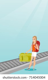 Happy caucasian passenger picking up suitcase from luggage conveyor belt at the airport. Young cheerful passenger taking her luggage from conveyor belt. Vector cartoon illustration. Vertical layout.