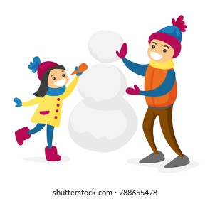 Happy caucasian white boy and girl building a snowman and playing in snow. Concept of outdoor winter leisure activity. Vector cartoon illustration isolated on white background.