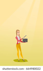 Happy caucasian woman holding camera slate for the filming. Smiling woman holding open clapperboard. Cheerful woman holding blank movie clapperboard. Vector flat design illustration. Vertical layout.